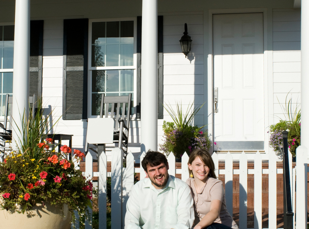Man and woman on front porch